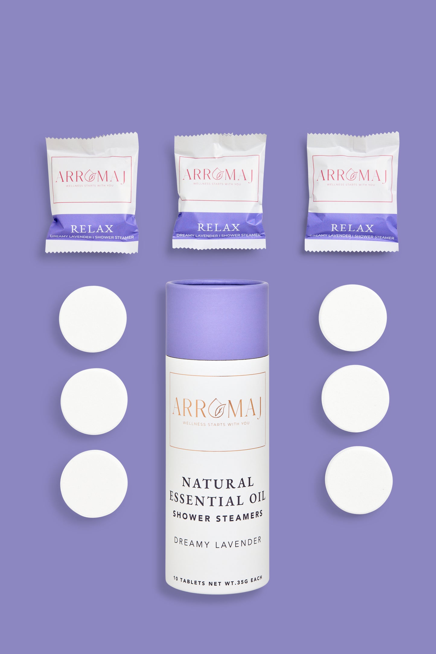 a canister of Arromaj lavender essential oil shower steamer and individually packaged shower steamers labeled relax and individual shower steamers tablets out of packaging