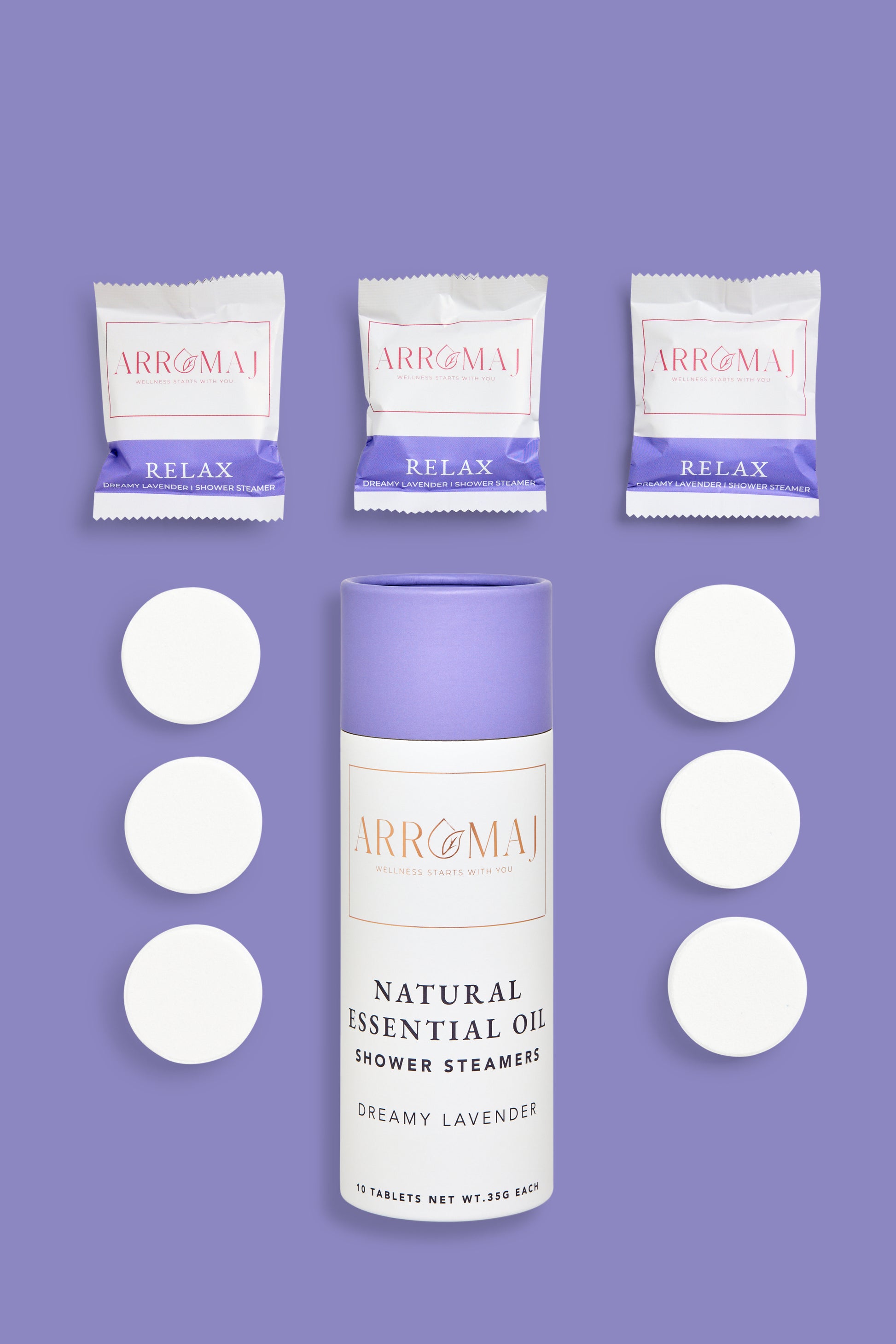 a canister of Arromaj lavender essential oil shower steamer and individually packaged shower steamers labeled relax and individual shower steamers tablets out of packaging