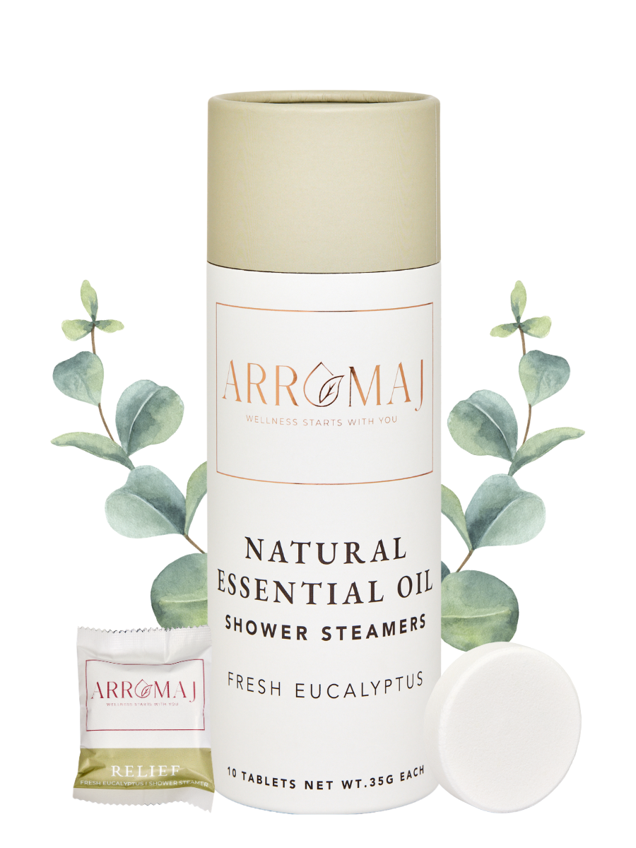 Arromaj natural essential oil shower steamers with eucalyptus leaves on a white background and an individual packaged essential oil shower steamer labeled relief.
