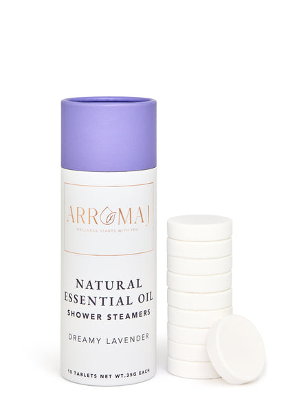 A canister of ARROMAJ natural lavender essential oil shower steamers with one steamer tablet beside it, labeled dreamy lavender.
